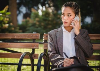 Photo by Ketut Subiyanto from Pexels: https://www.pexels.com/photo/business-woman-in-suit-on-park-bench-talking-on-mobile-4962784/