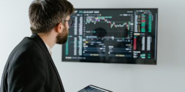 Photo by Tima Miroshnichenko: https://www.pexels.com/photo/man-in-black-suit-holding-a-digital-tablet-and-looking-at-data-on-screen-7567595/