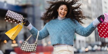 Photo by Tim Douglas : https://www.pexels.com/photo/happy-woman-jumping-with-shopping-bags-6567607/