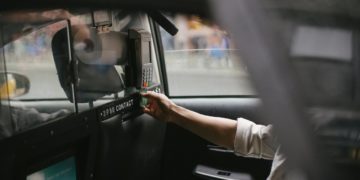Photo by Tim  Samuel: https://www.pexels.com/photo/crop-male-passenger-inserting-card-in-credit-card-reader-in-taxi-5835268/