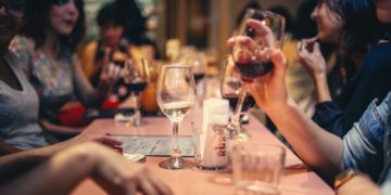 Photo by Helena Lopes: https://www.pexels.com/photo/people-drinking-liquor-and-talking-on-dining-table-close-up-photo-696218/