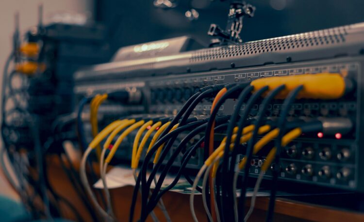 Photo by Jah Nomad: https://www.pexels.com/photo/a-close-up-of-a-computer-with-wires-and-cables-17220238/
