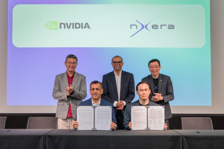 MOU signing on supporting national and regional AI development. (Back row, from left to right): Mr Lew Chuen Hong, Chief Executive Officer of the Infocomm Media Development Authority (IMDA); Dr Janil Puthucheary, Senior Minister of State, Ministry of Communications and Information; Mr Bill Chang, CEO of Nxera and Singtel's Digital InfraCo unit. (Front row, from left to right): Mr Ronnie Vasishta, SVP Telecom, NVIDIA; Mr Lee Yoong Kin, Vice President of Products & Platform, Nxera.